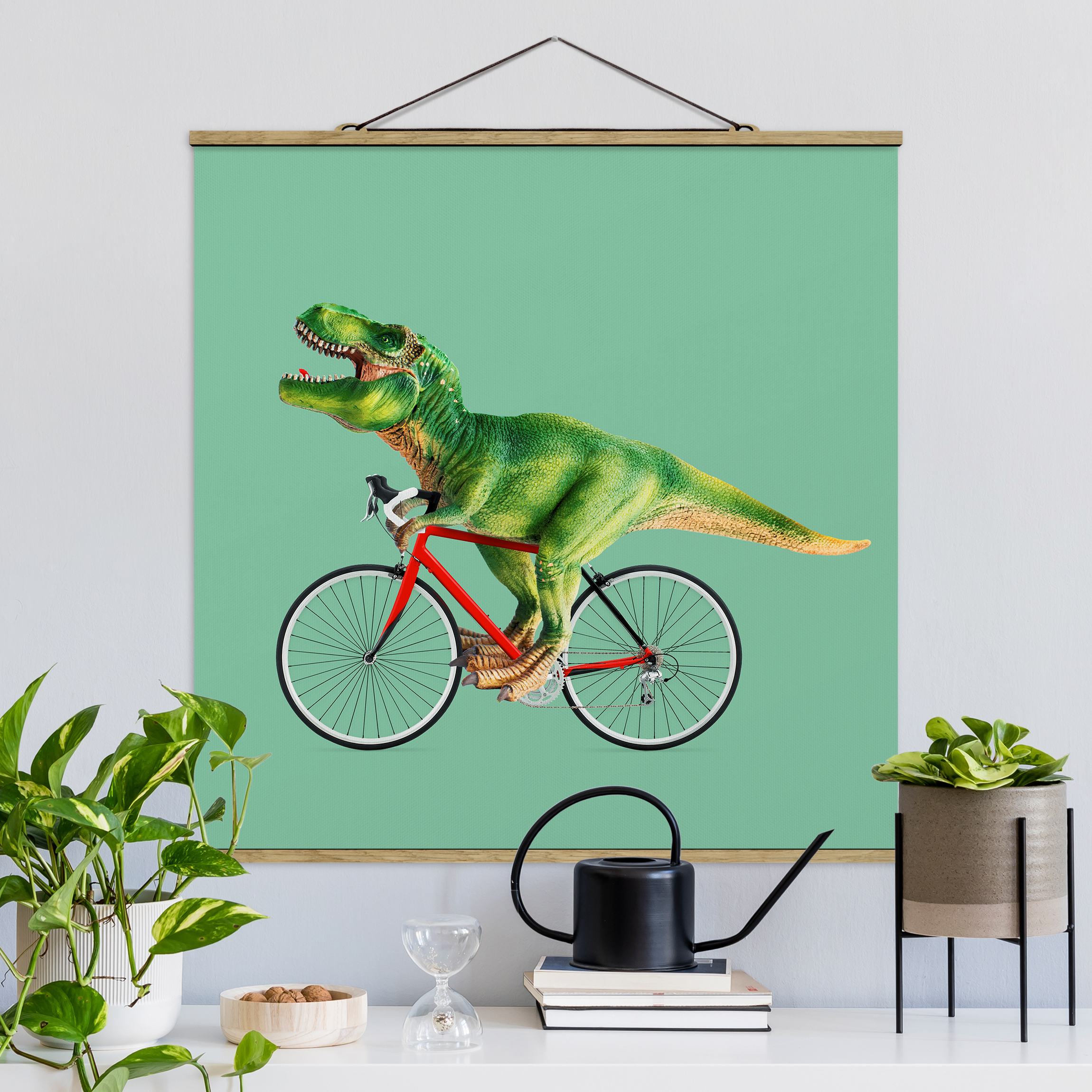 Stoffbild mit Posterleisten Dinosaurier mit Fahrrad