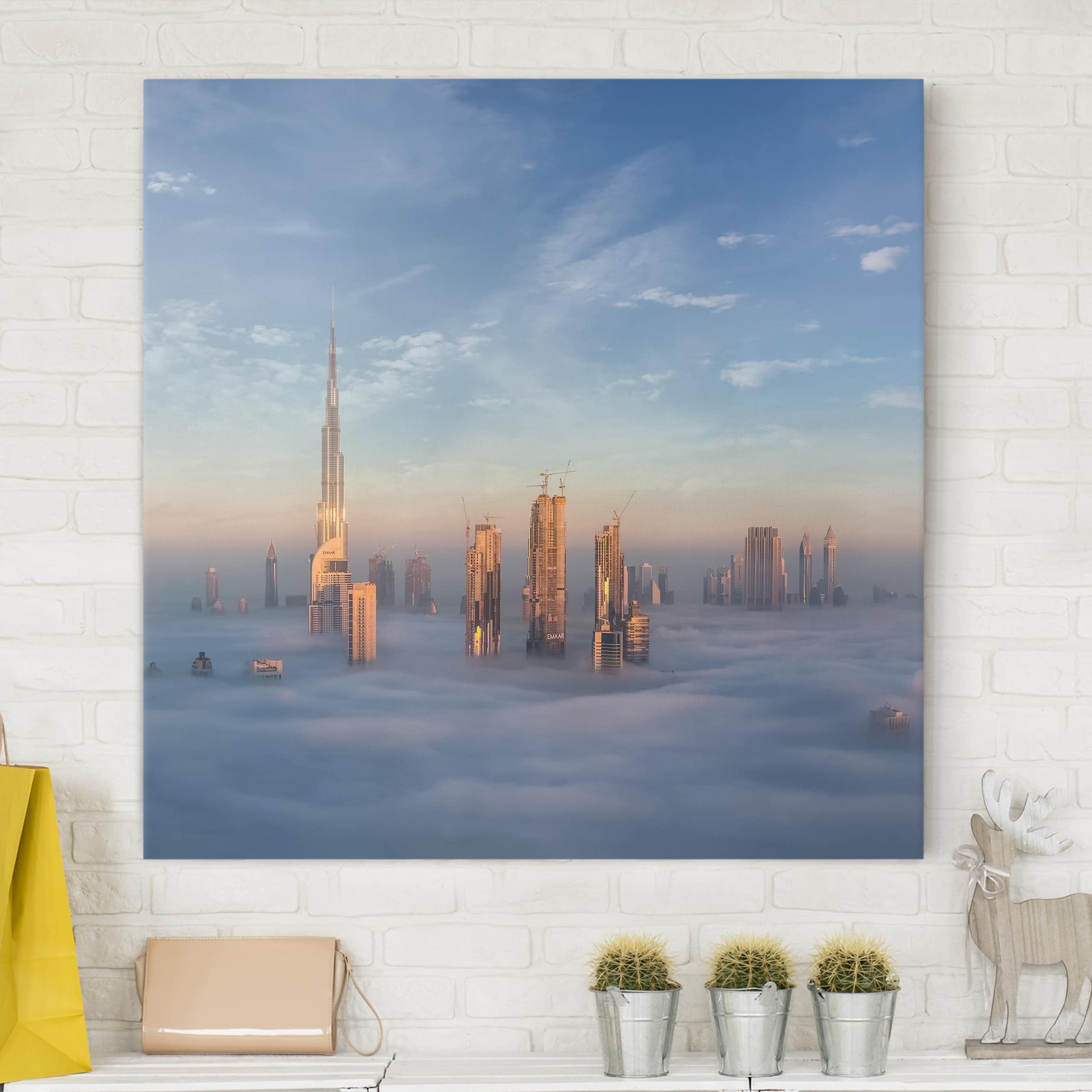 Leinwandbild - Quadrat Dubai über den Wolken