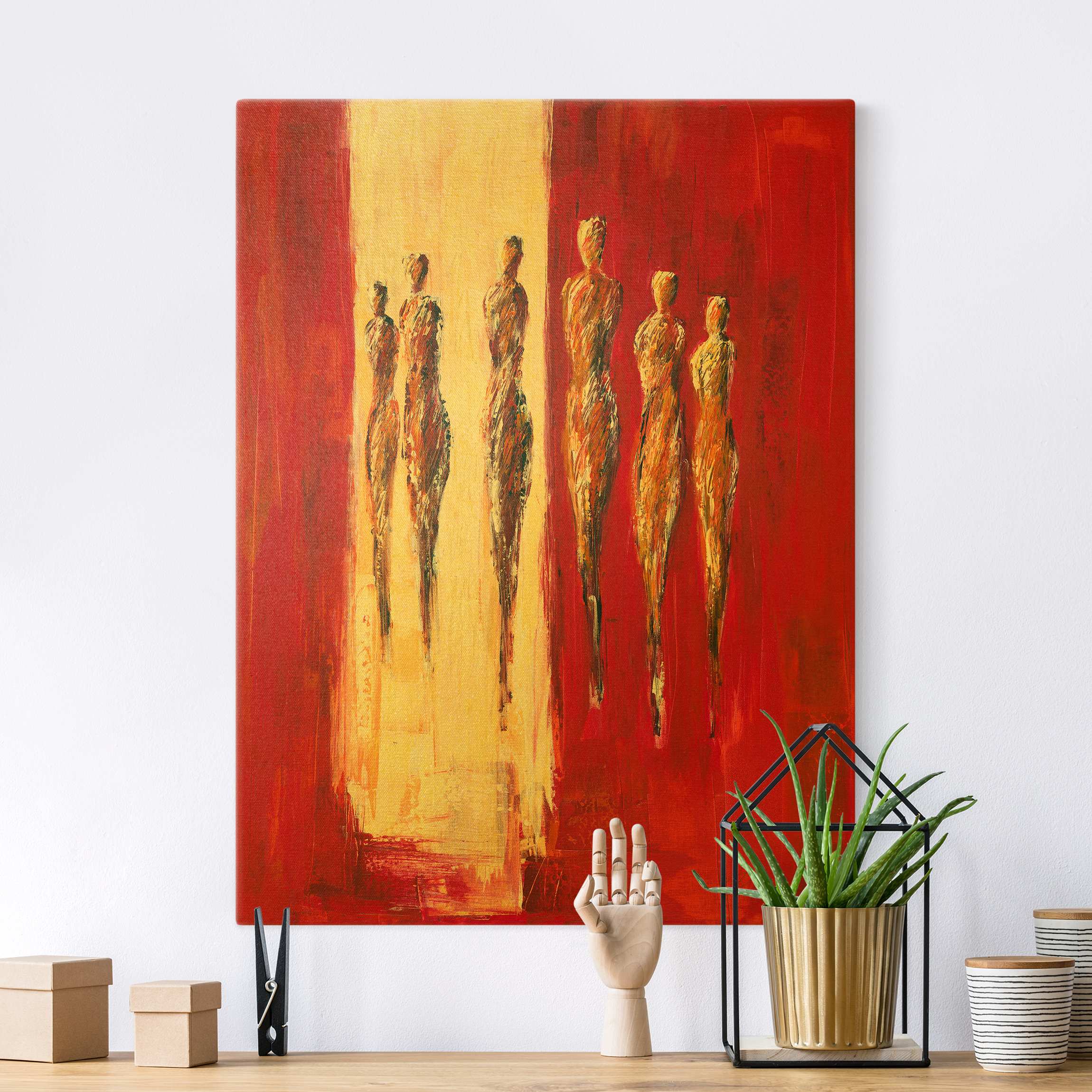 Leinwandbild Sechs Figuren in Rot