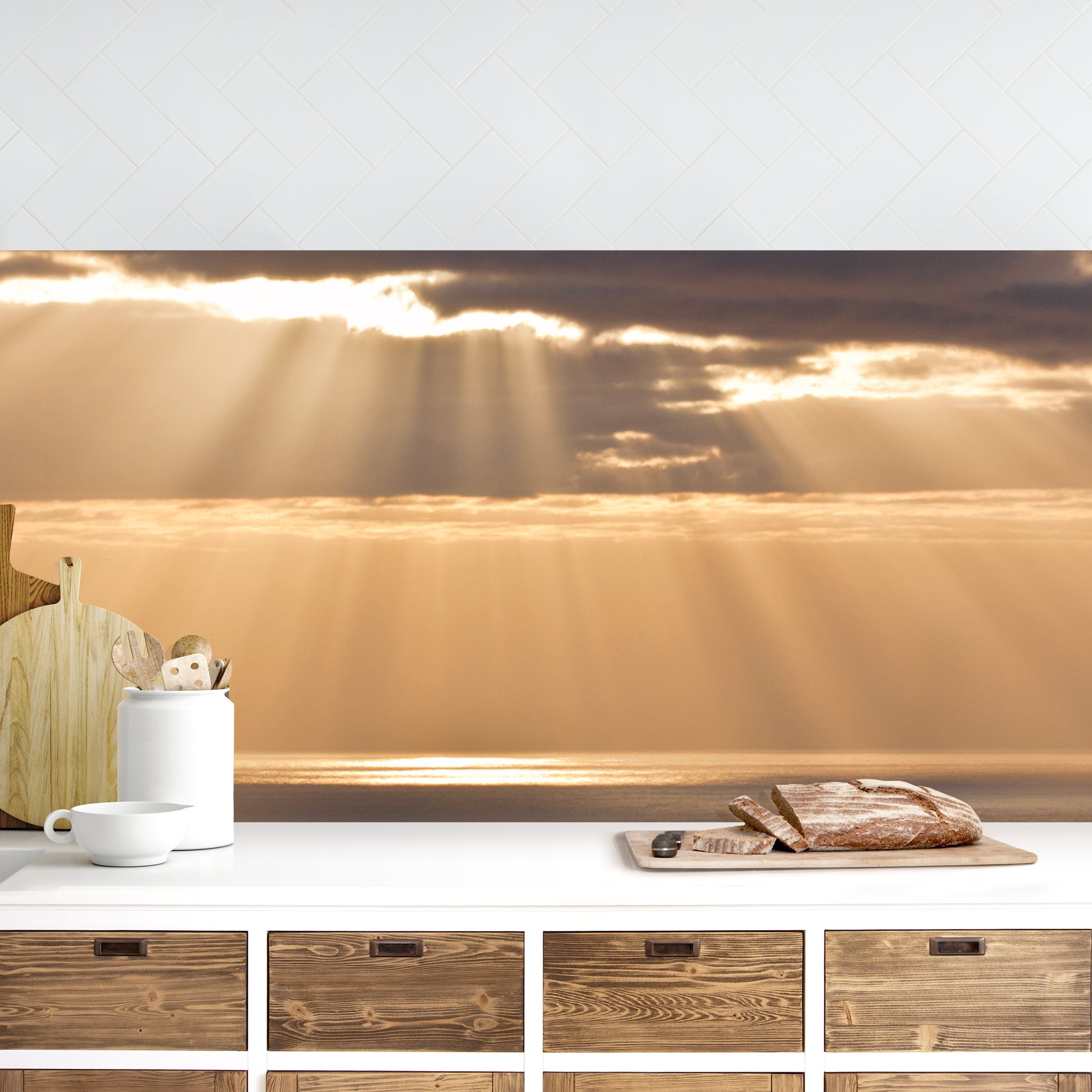 Küchenrückwand Sonnenstrahlen über dem Meer
