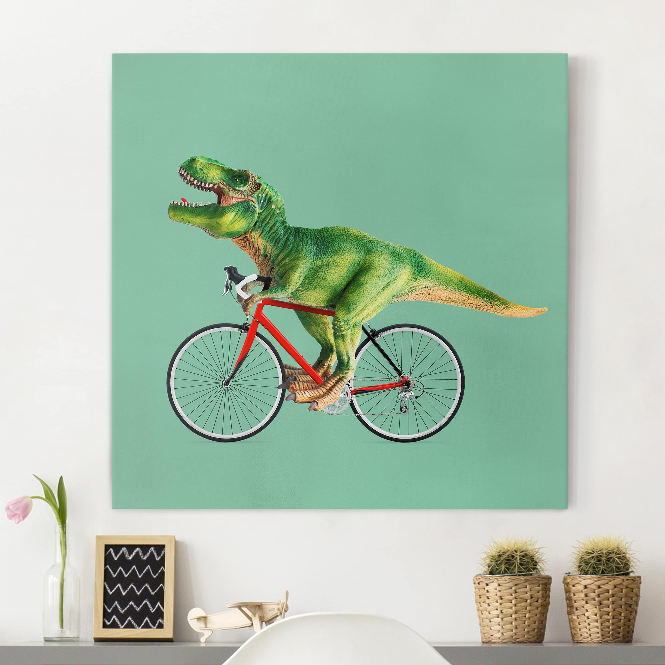 Leinwandbild - Quadrat Dinosaurier mit Fahrrad