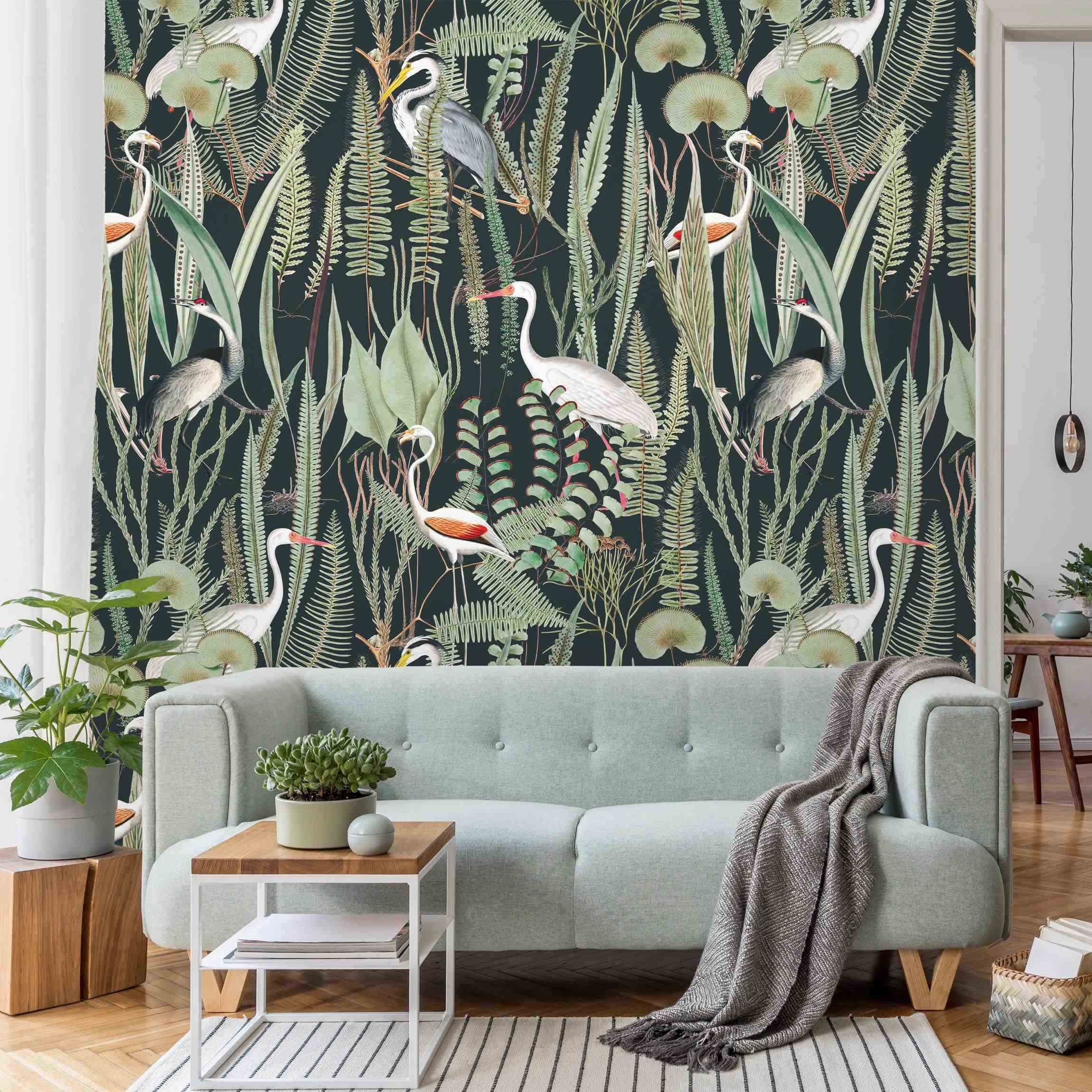 Fototapete Flamingos und Störche mit Pflanzen auf Grün