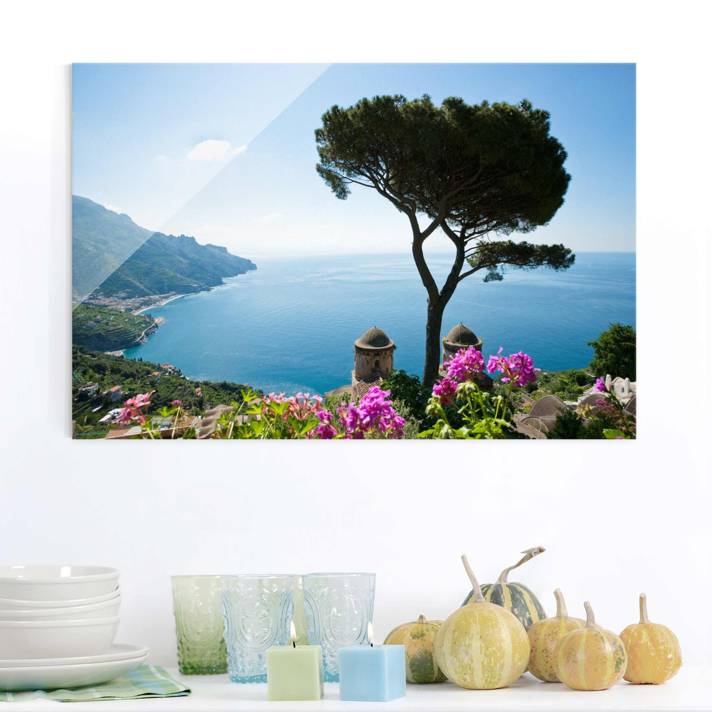 Glasbild - Querformat Ausblick vom Garten aufs Meer