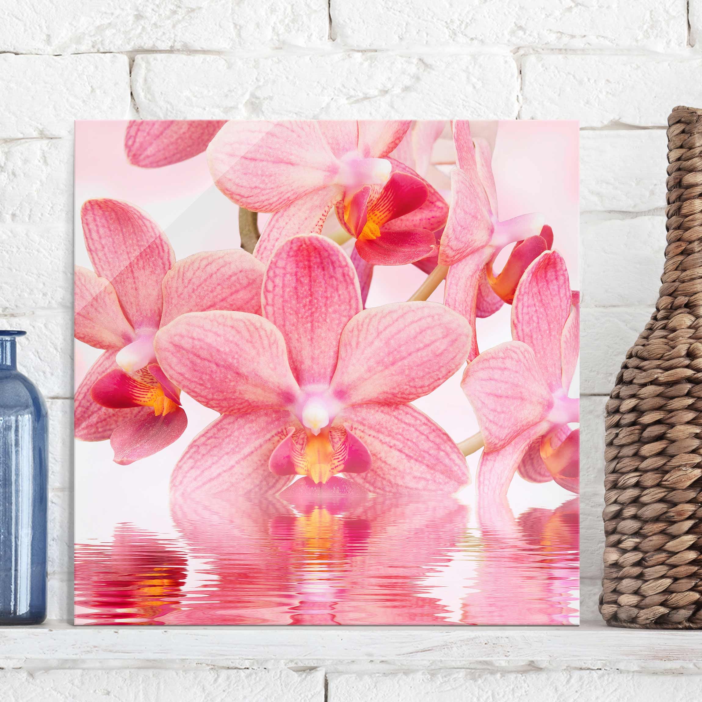 Glasbild - Quadrat Rosa Orchideen auf Wasser