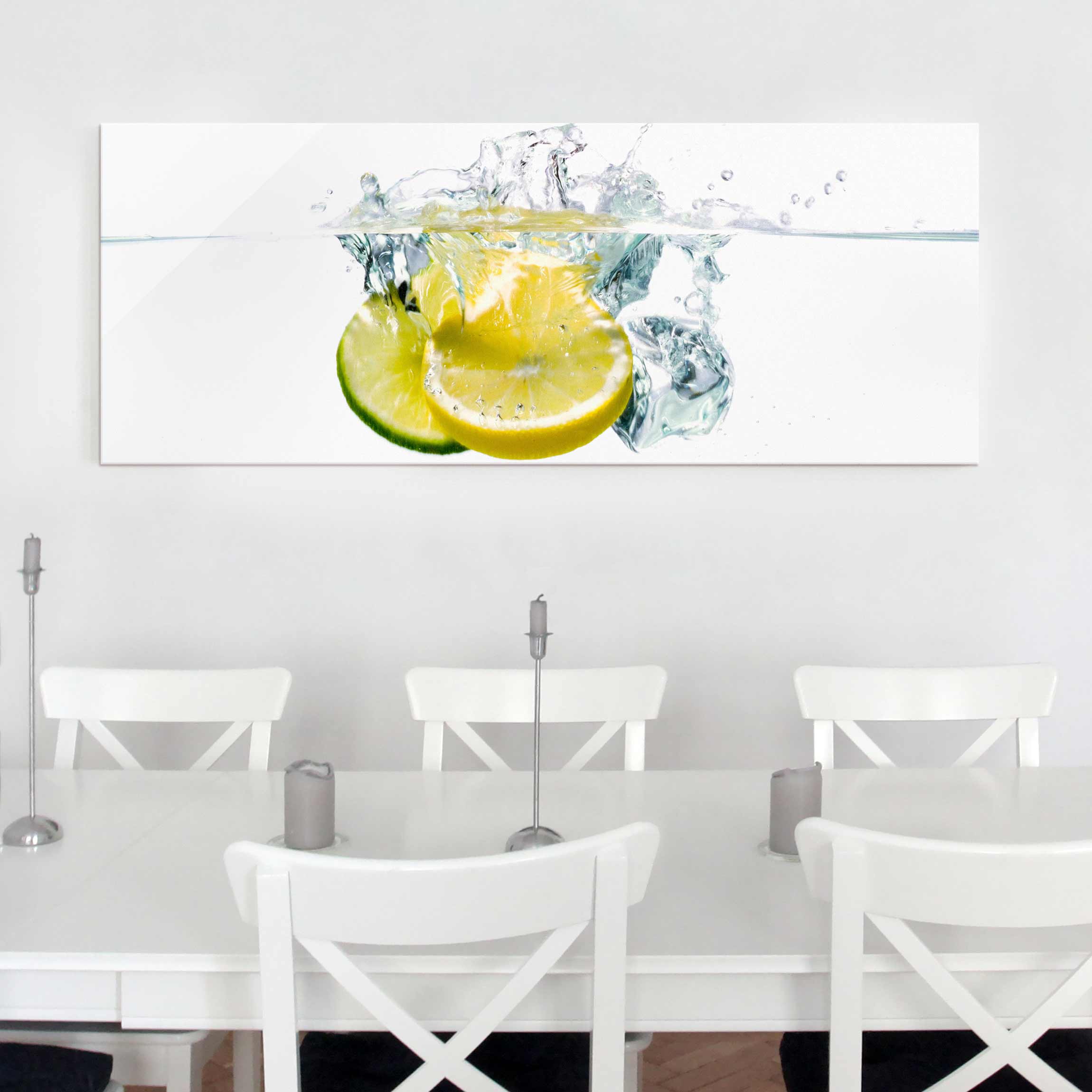 Glasbild Küche Zitrone und Limette im Wasser