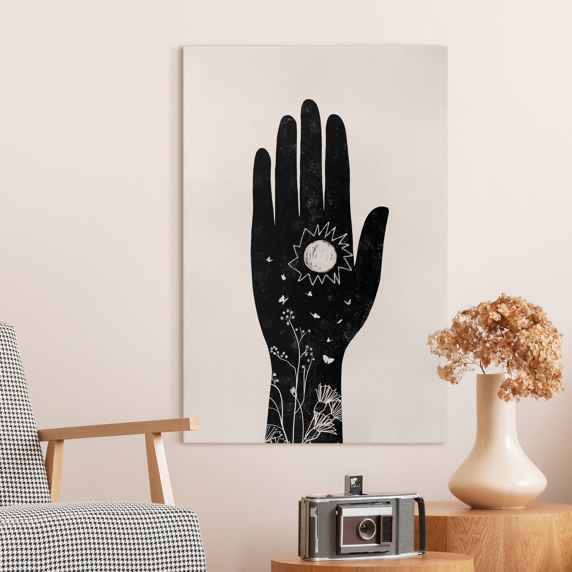 Leinwandbild Hand mit Sonne