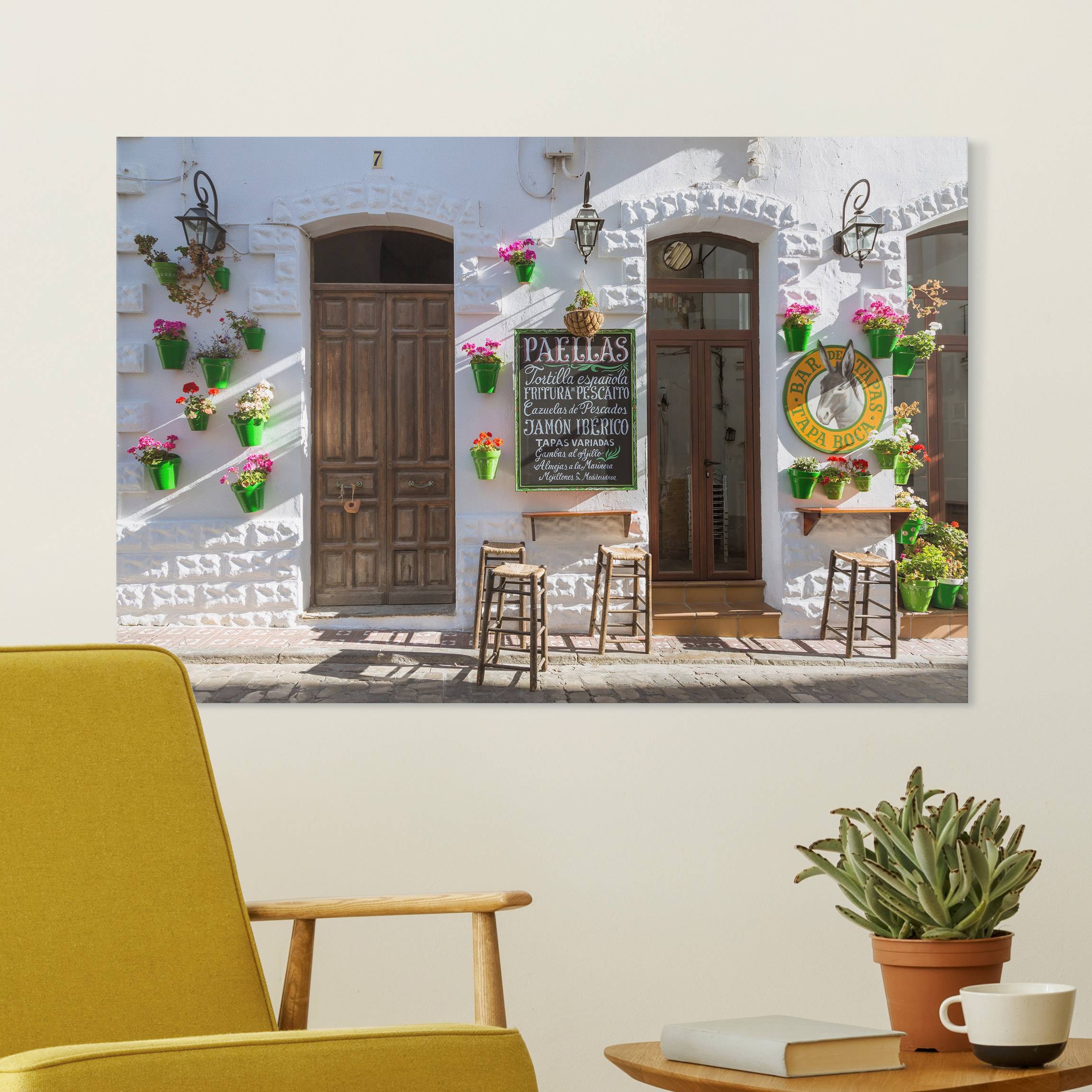 Leinwandbild Bar de Tapas mit Blumentöpfen