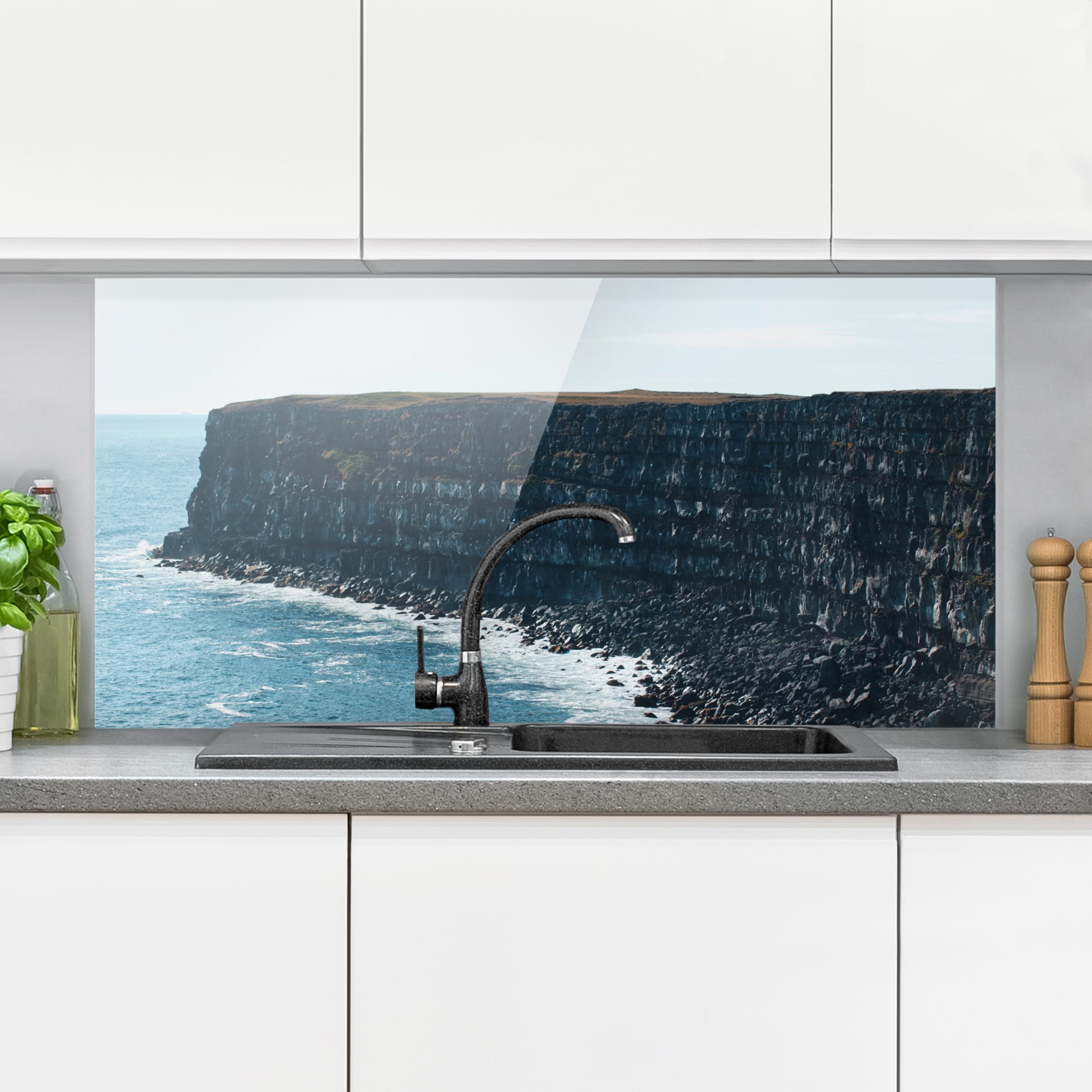 Spritzschutz Felsige Klippen auf Island