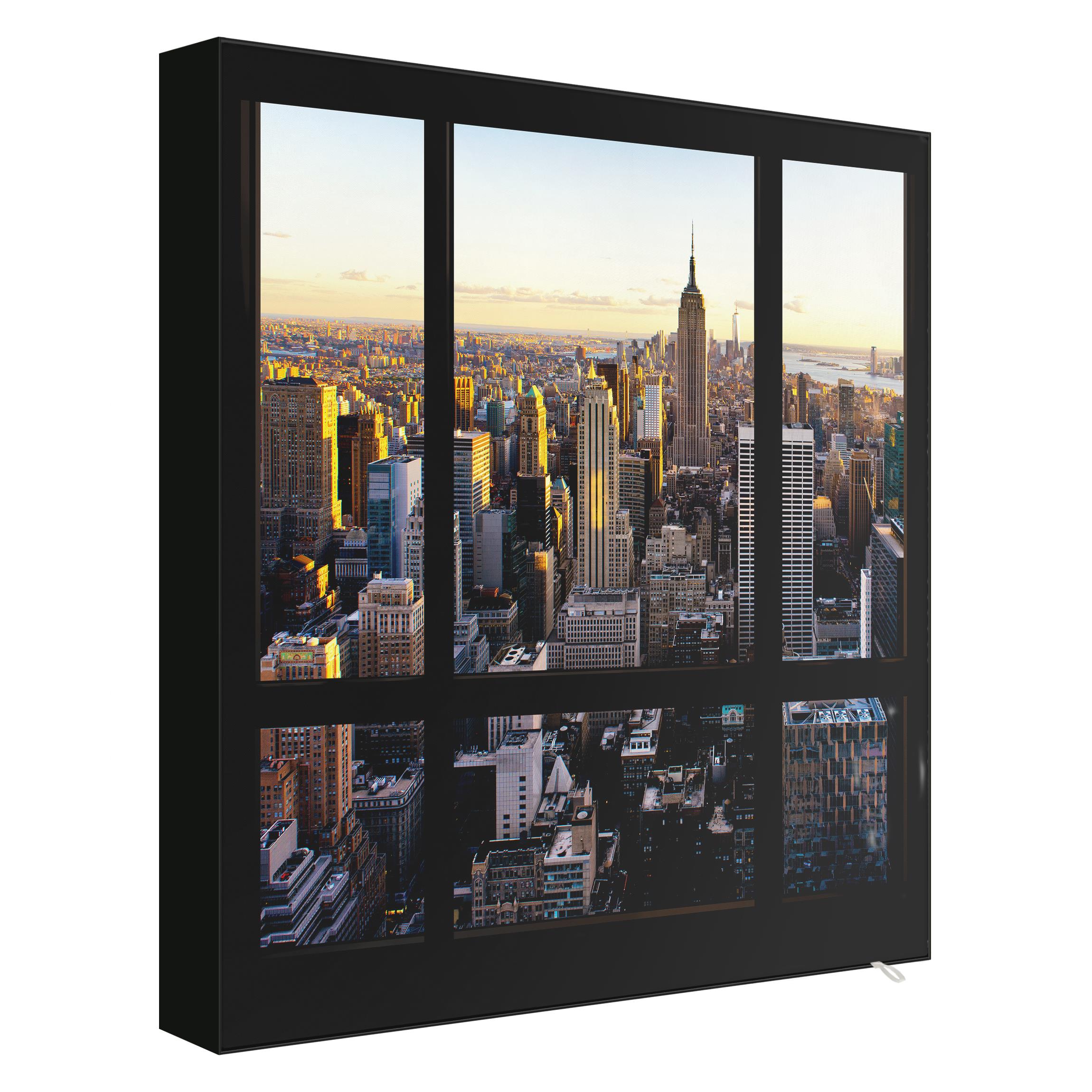Wechselbild Fensterblick am Abend über New York