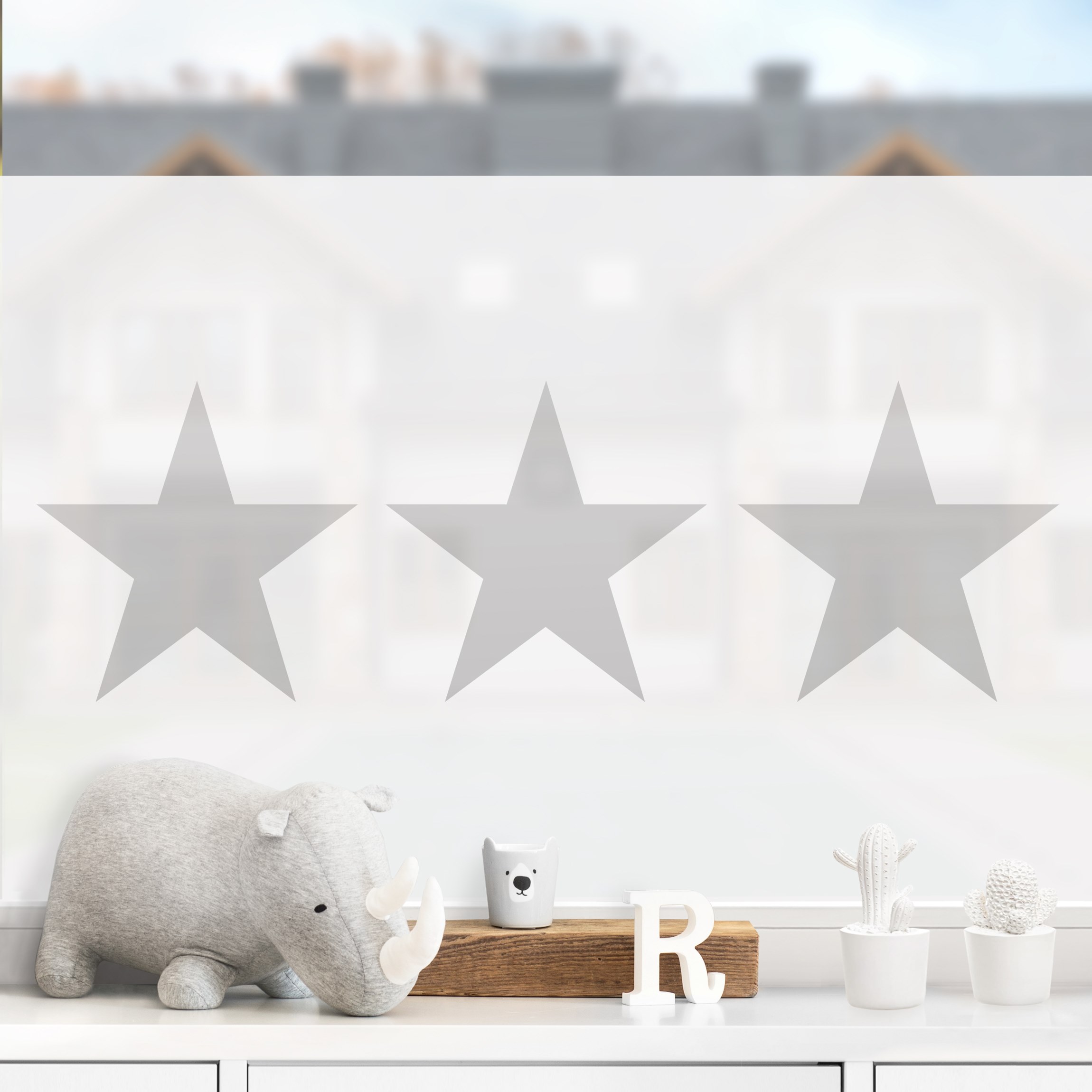 Fensterfolie Große graue Sterne auf Weiß