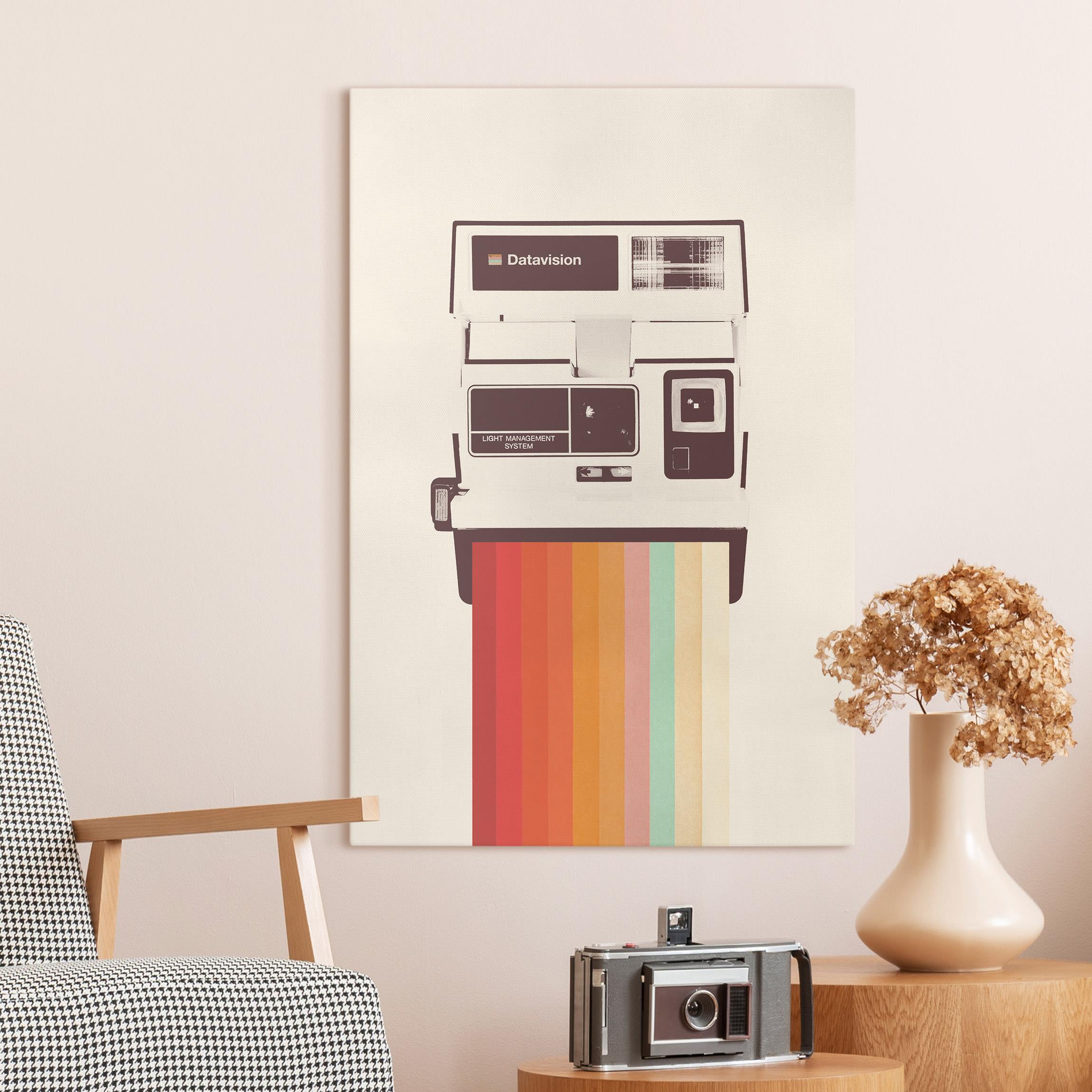 Leinwandbild Retro Kamera mit Regenbogen Film