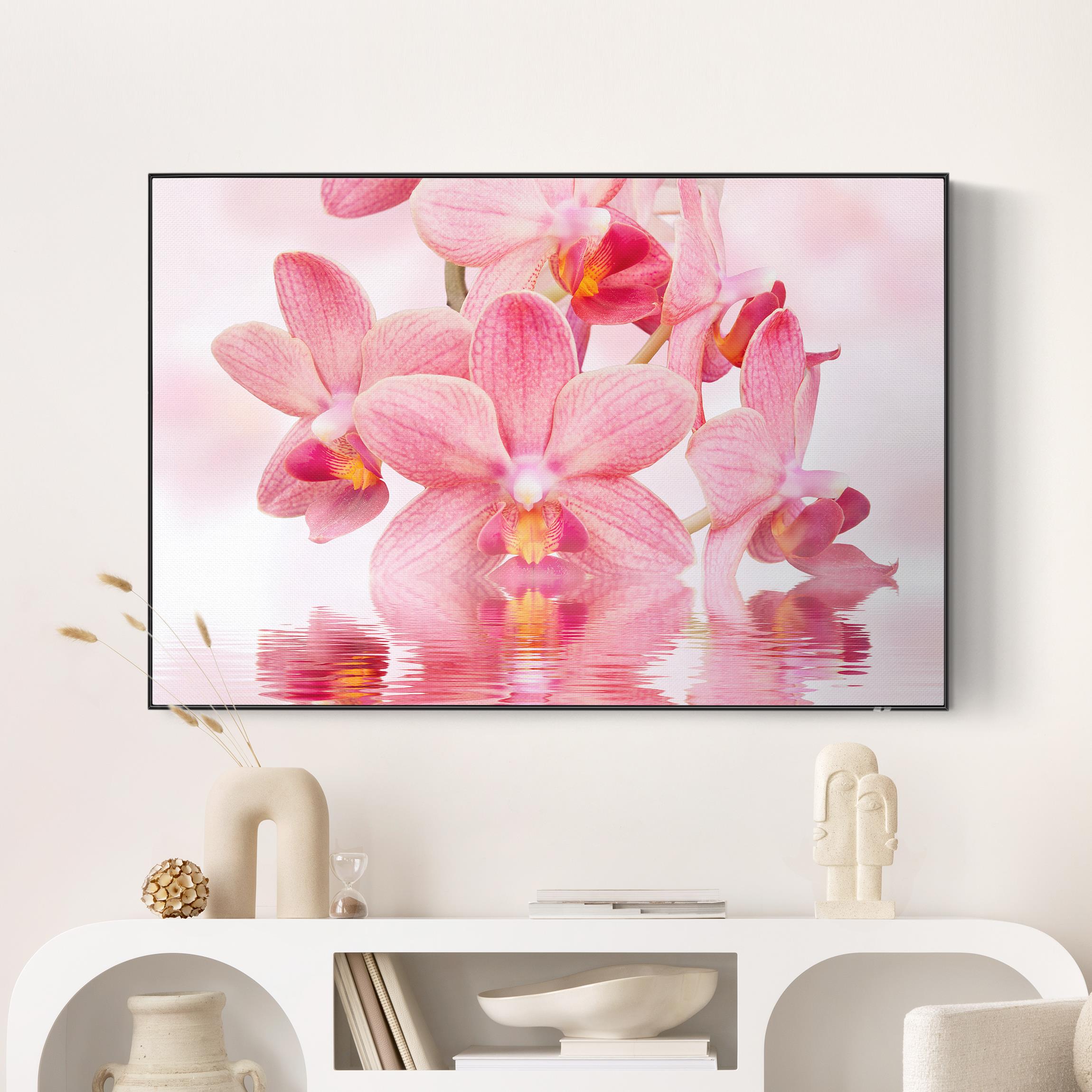 Akustik-Wechselbild Rosa Orchideen auf Wasser