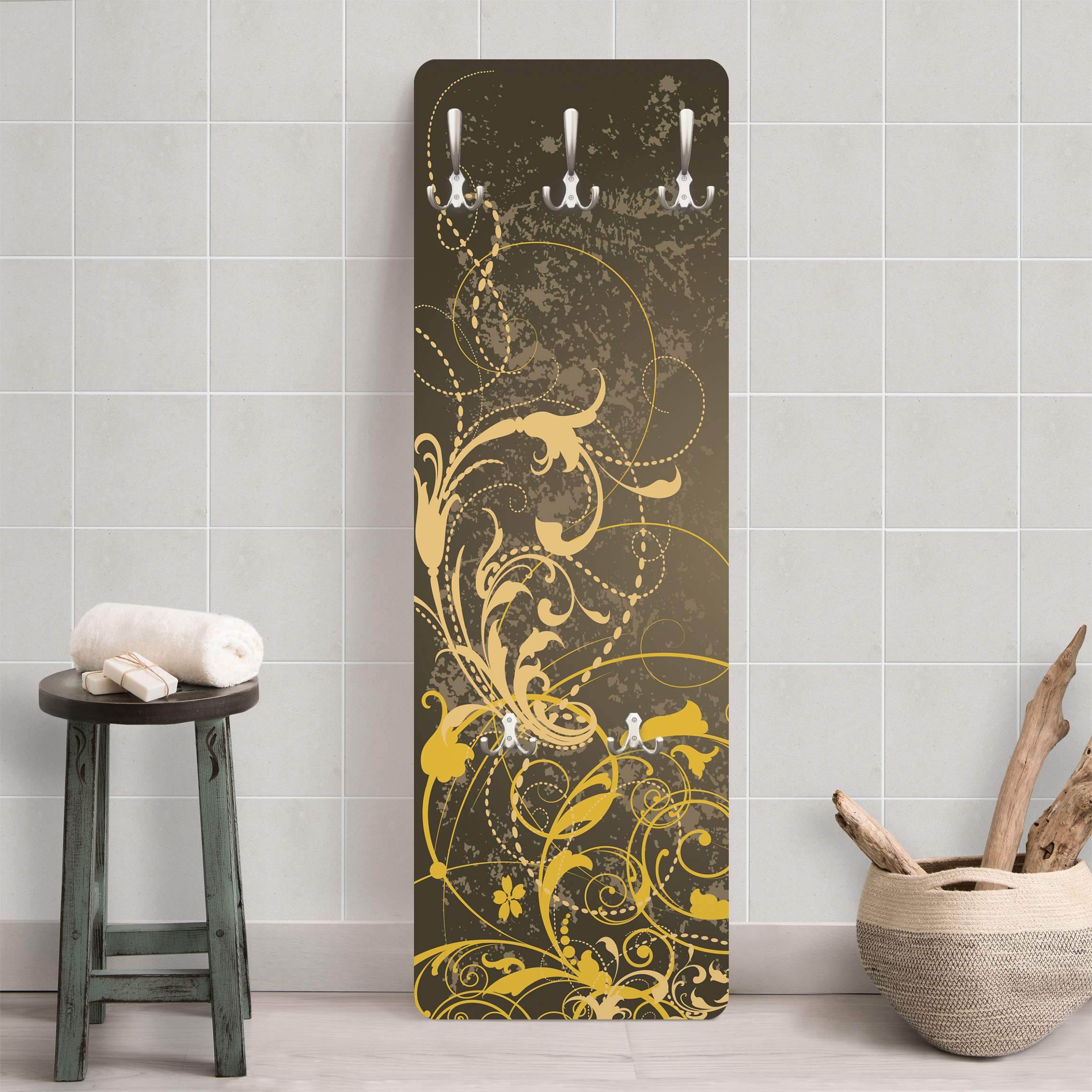 Wandgarderobe Schnörkel in Gold