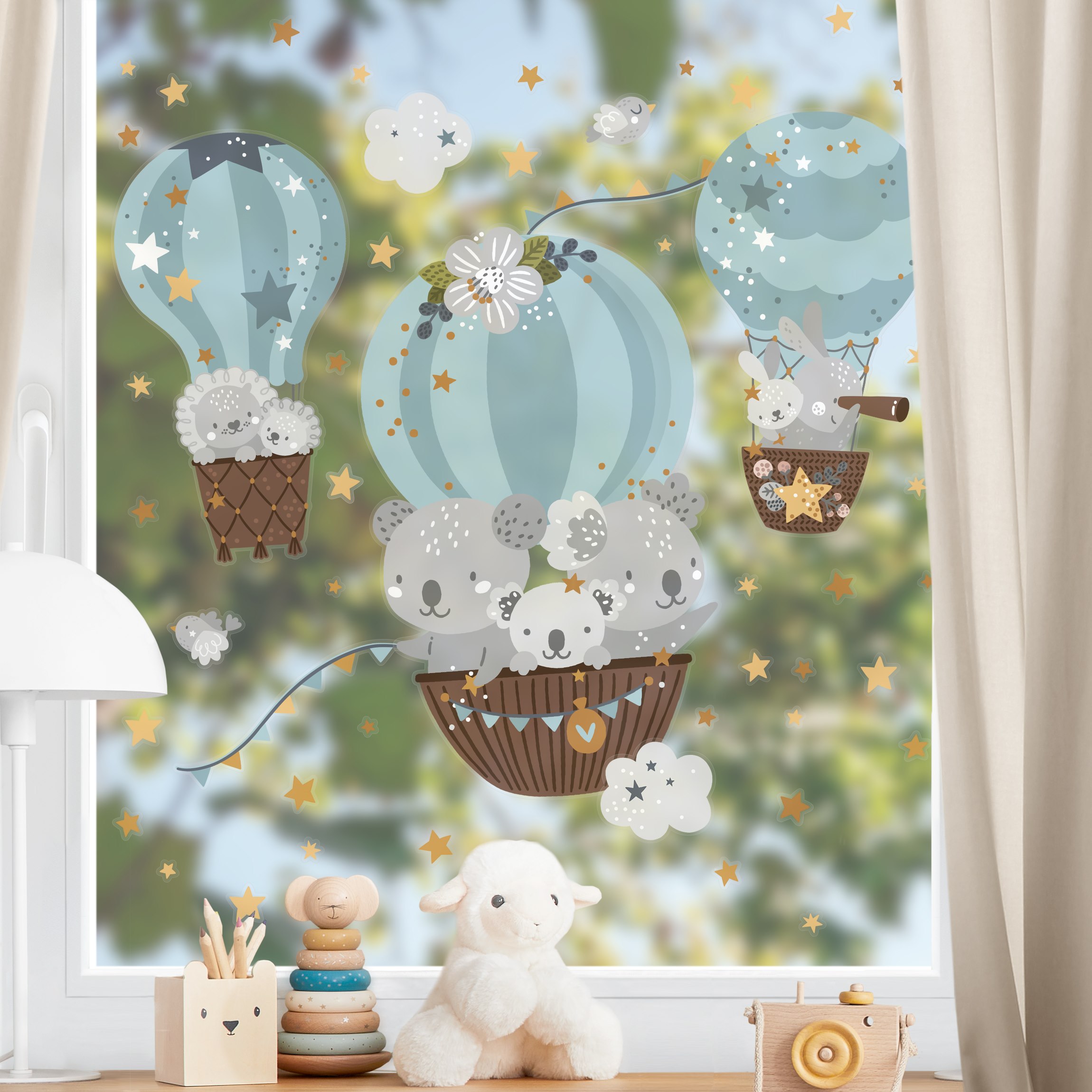 Fensteraufkleber Tiere in Ballons mit Sternen blau