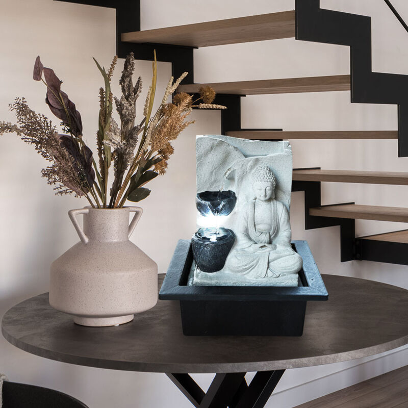 Tischbrunnen mit Pumpe Springbrunnen mit LED Beleuchtung Buddha Design Zimmerbrunnen grau Dekoration, LxBxH 21x18,5x25,5 cm