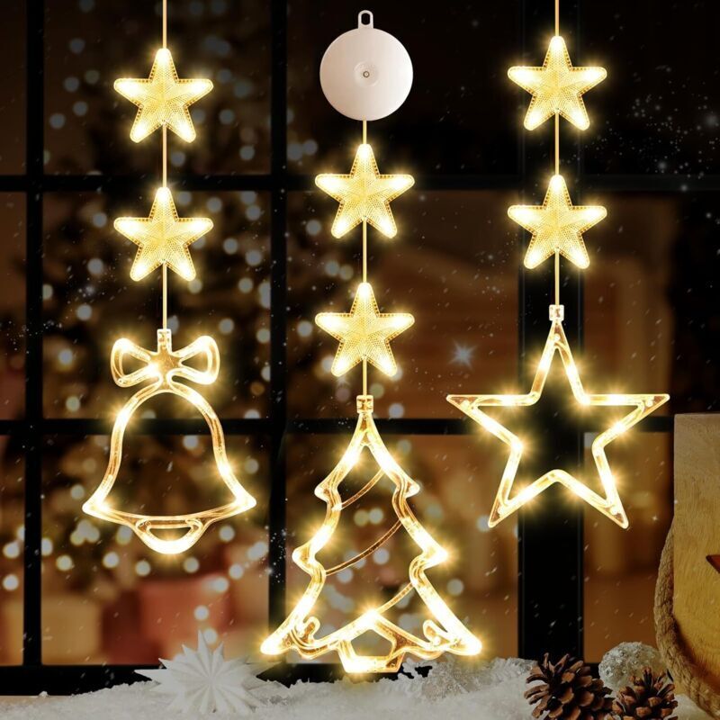 Weihnachtsbeleuchtung und Fenster, Weihnachtsbeleuchtung und Holzbeize, fünfzackige Sterne, Glocken, Weihnachtsbäume