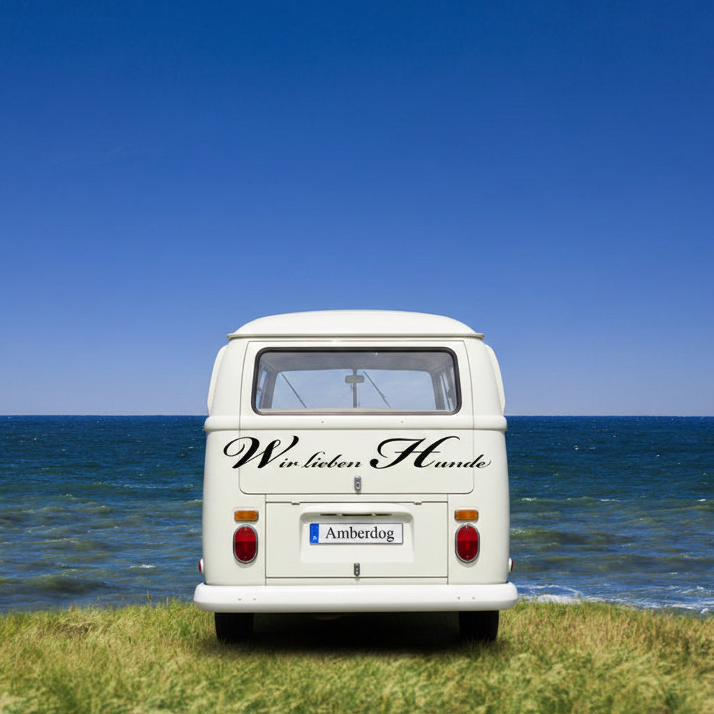 Aufkleber & Wandtattoo „Wir lieben Hunde“ | Wohnmobil, Wohnwagen, Auto & Wand - 50x30cm / Schwarz