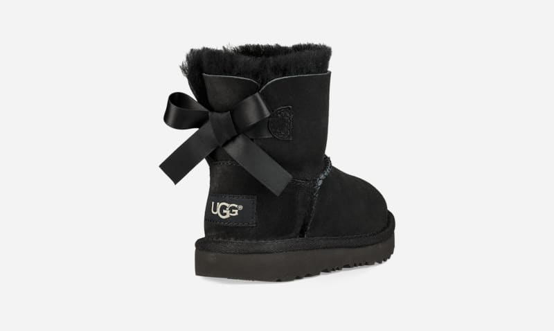 UGG® Mini Bailey Bow II Boot für Kinder | UGG® EU in Black, Größe 22, Twinface