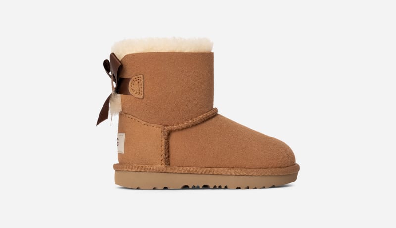 UGG® Mini Bailey Bow II Boot für Kinder | UGG® EU in Brown, Größe 22, Twinface