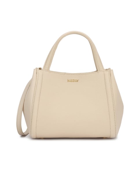 Leder Handtaschen in der Hand und auf der Schulter