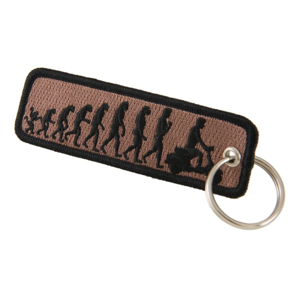 Schlüsselanhänger mit Motiv 'Evolution' 