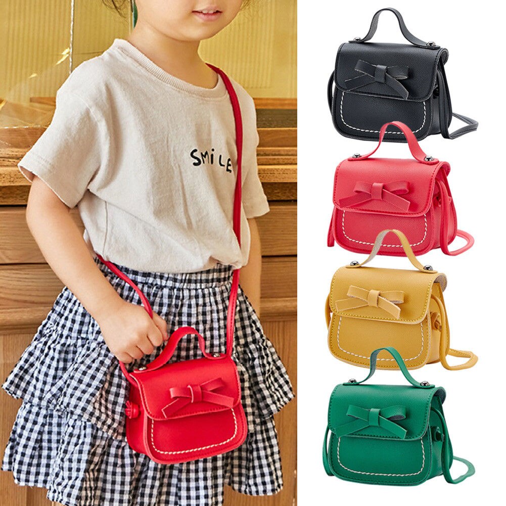 Neue Kleinkind Baby Bote Taschen freundlicher freundlicher Mädchen Prinzessin Schulter Tasche Handtasche Solide Bowknot Tote Geldbörsen Mini Taschen