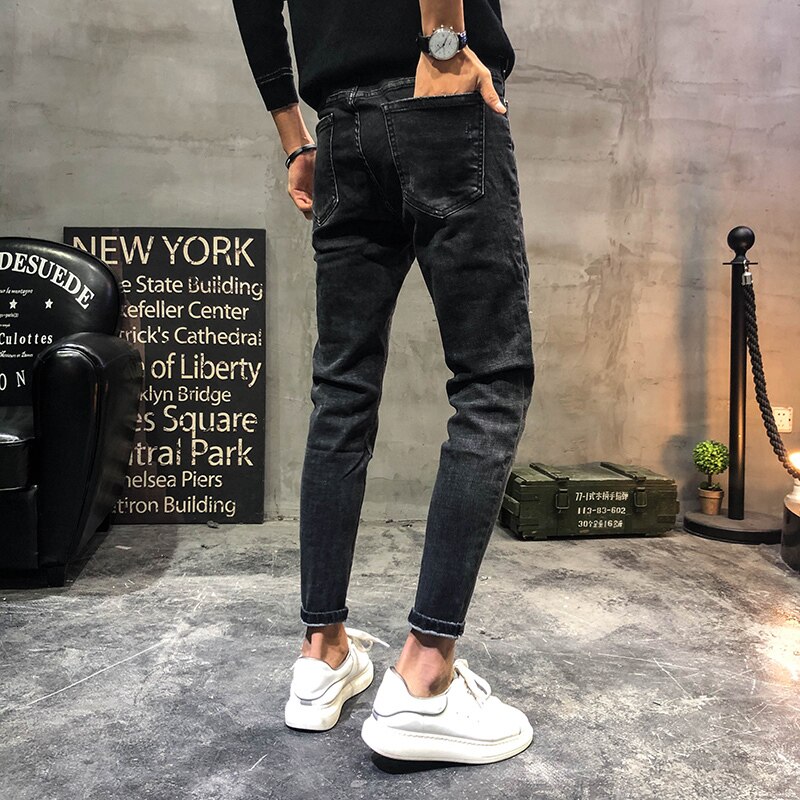 Neue UYUK herbst Winter freizeit Temperament geist Chinesischen stil stickerei flut schlank baumwolle männer Jeans mann streetwear