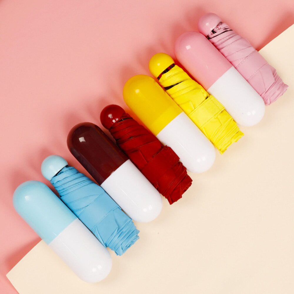 Mini Falten Kapsel Kleinen Regenschirm Mit Pille Paket Kasten Tasche Sonnenschirm Regen Anti-Uv Tragbare Reise Regenschirm sonnig Regnerischen Schild