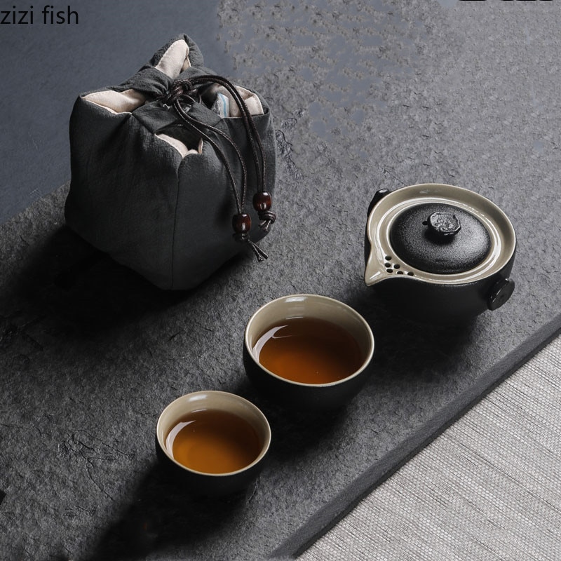 Ein Topf und Zwei Gläser von Reise Tee-einstellen und EINE Einfache Zwei Tasse Außen Reise Schnelle Passagier Tasse Kung fu Tee-einstellen Tee Topf einstellen