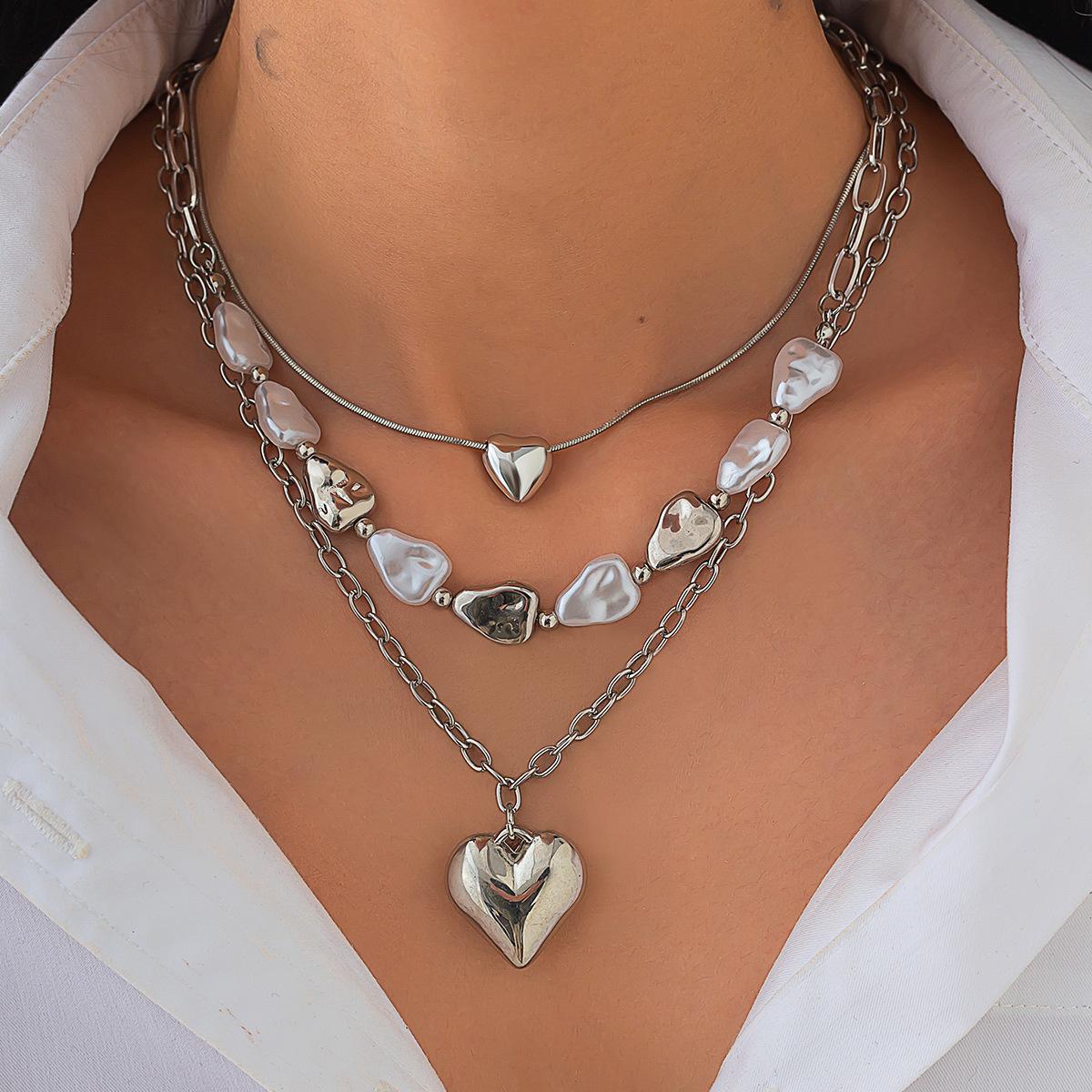 DIEZI Mehrreihige Barock Imitationsperlen Choker Halskette für Damen Partygeschenk Mode Quaste Herz Anhänger Halskette Schmuck