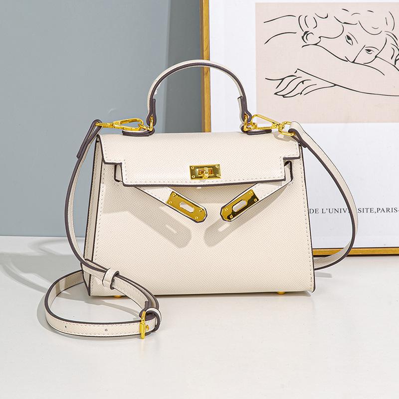 Frühling und Sommer Neue Nische Pendler Handtasche Modische und modische Handtasche für Damen Vielseitige Ein-Schulter Umhängetasche