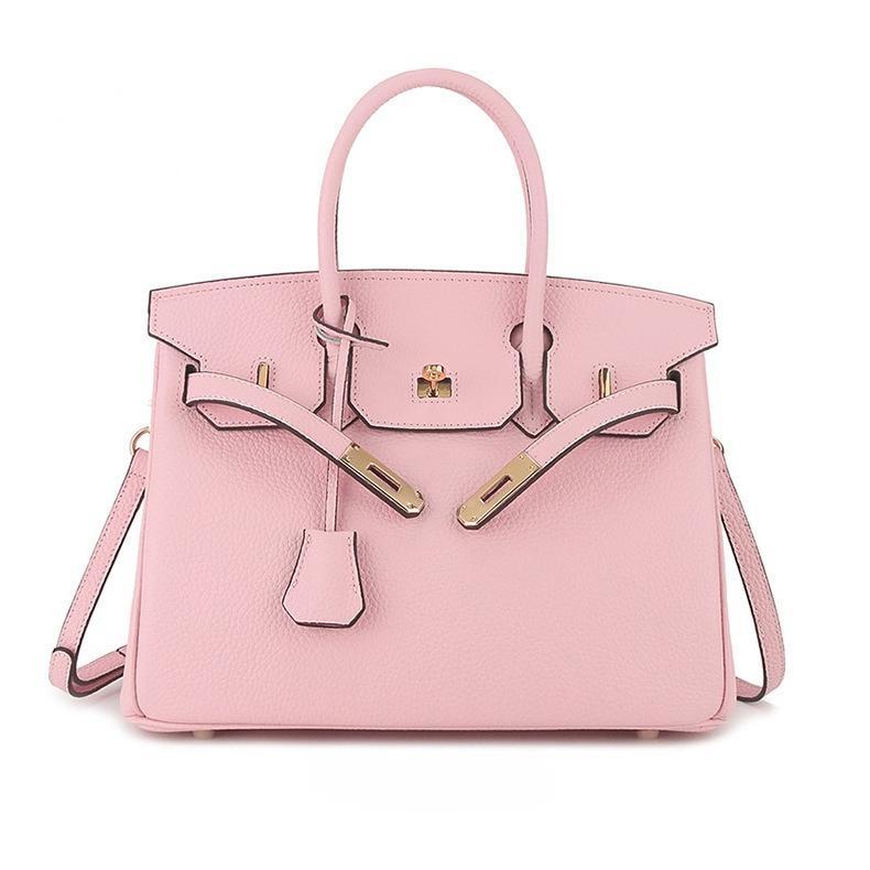 Erste Schicht togo Rindsleder große Kapazität Leder Litschi-Muster Damenmode Schloss Handtasche 30x16x21cm hellrosa
