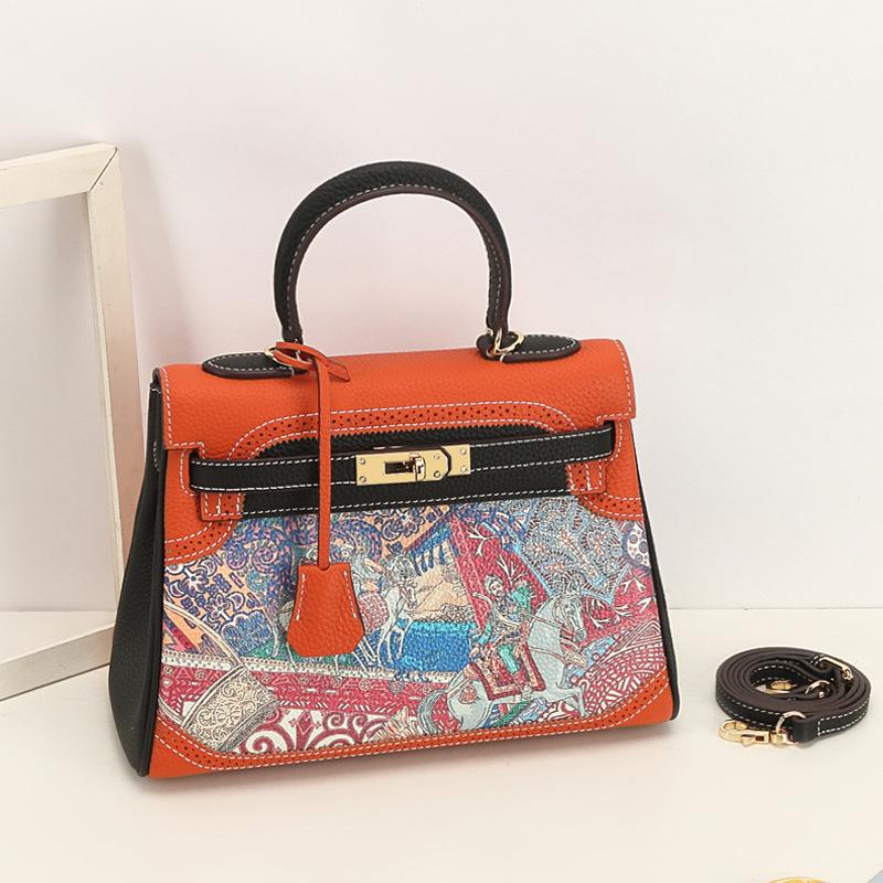 Neue Mode bedruckte Graffiti Kai Tasche Cartoon-Muster aus echtem Leder Damen Tasche Kopfschicht Leder Schulter Kreuz Schulter Handtasche 28x12x22cm