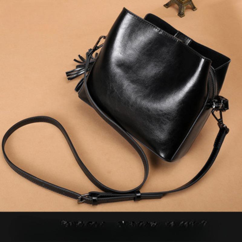 Damen Handtasche aus erstklassigem Rindsleder Neue Mode Quasten Handtasche für Damen Damen Umhängetasche Schultertasche black