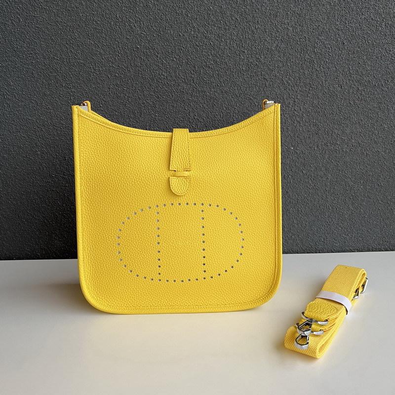 2025 Neue echtes Leder Top-Schicht Rindsleder Litschi-Muster Unisex ausgehöhlte Umhängetasche Echte Leder Damenhandtasche 32cm zitronengelbe