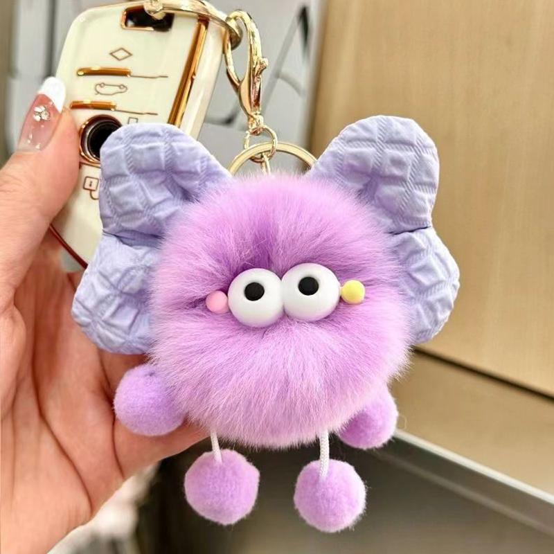 Cartoon süße Schleife Brikett Elf Puppe Anhänger Schlüsselanhänger süße schielende Schleife Fellknäuel Puppe Schlüsselanhänger Spielzeug violett