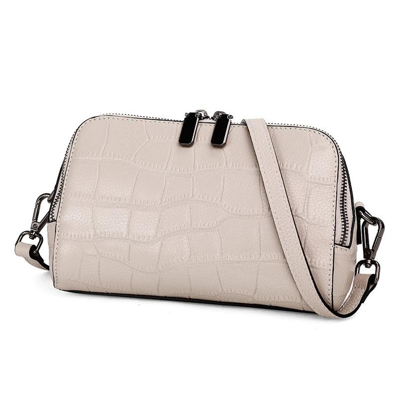 Neue Ledertasche für Damenhandtaschen mit neuem Stil und modischen Umhängetaschen. Vielseitige kleine quadratische Taschen beige