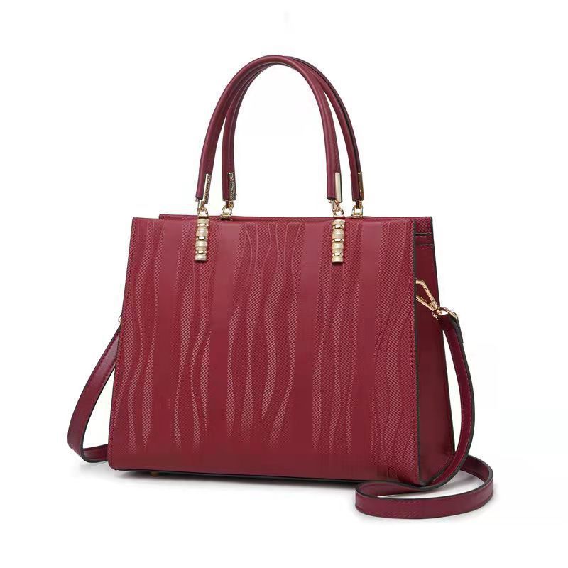 Neue modische und vielseitige Damen-Kuhleder-Muttertasche Große Kapazität Muttertasche Handtasche Handtasche Diagonale Umhängetasche brown