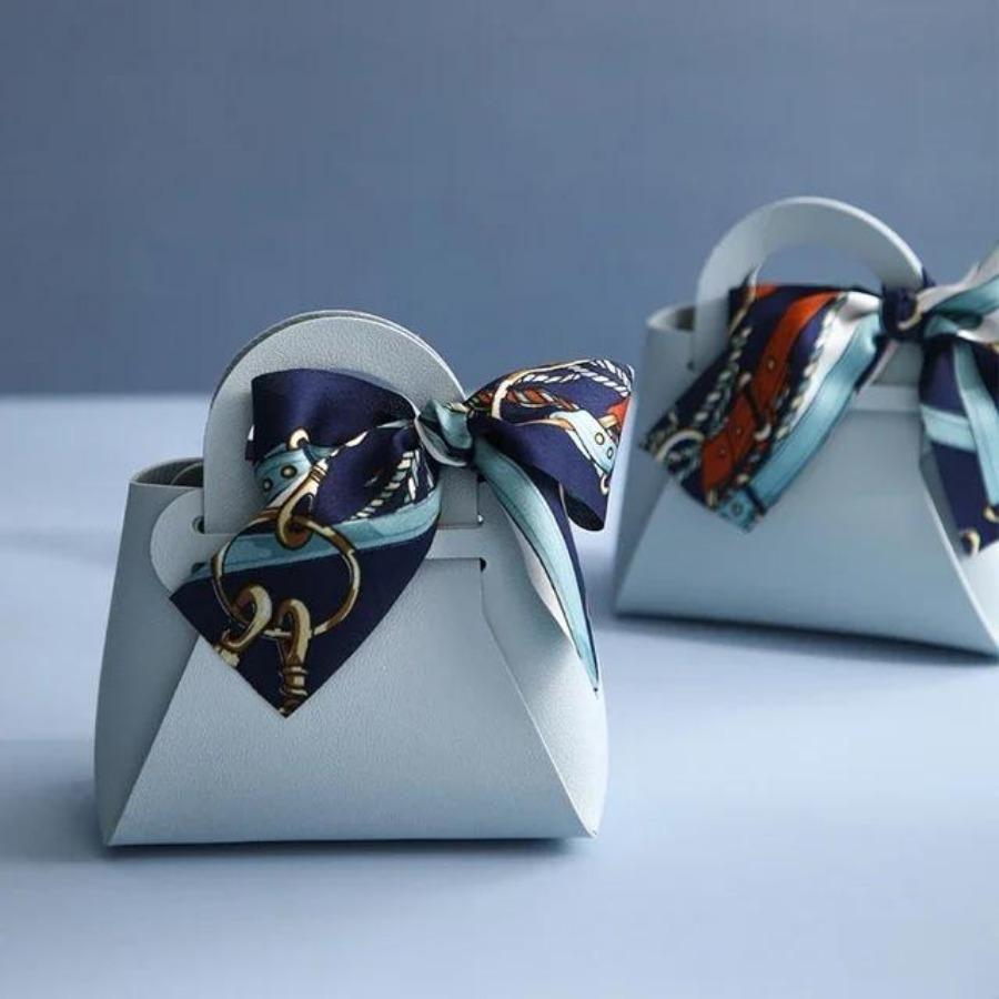 Verteilen Sie rosa Geschenktüten aus Leder für Hochzeitsgeschenke, Mini-Handtasche mit Band, Süßigkeiten-Verpackungsbox, Party-Dekoration himmelblaue