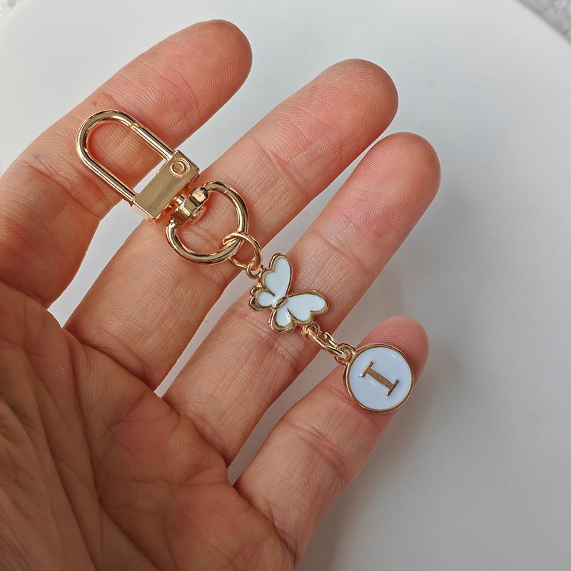 1 Stück Schlüsselanhänger Leichter Taschenanhänger Monogramm-Anhänger Metall-Schlüsselanhänger Auto-Schlüsselbegleiter Schmetterling Monogramm-Schlüsselanhänger Langlebigkeit Schlüssel-Logo