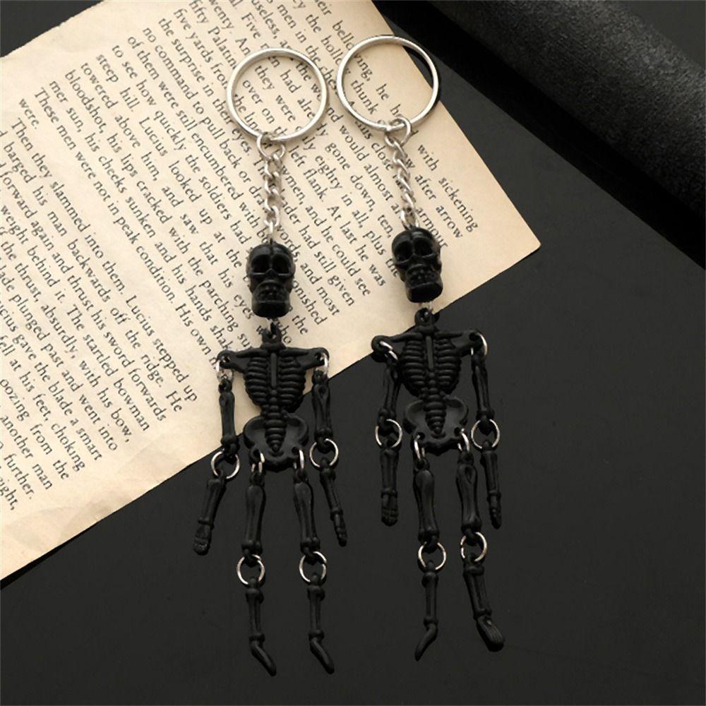 Mehrgelenkiger Modeschmuck, koreanischer Auto-Schlüsselanhänger, Totenkopf-Schlüsselanhänger, Skelett-Schlüsselanhänger, leuchtender Schlüsselanhänger 1pc Black