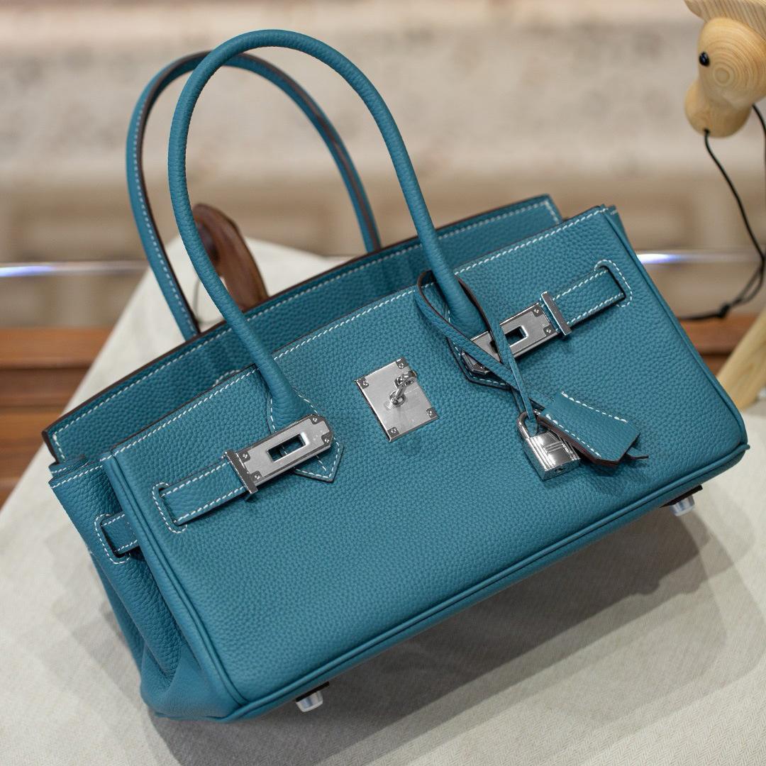 Neue lange tragbare Platin-Tasche silberne Schnalle Rindsleder erste Schicht Mode Umhängetasche Handtasche Schloss Leder Damen-Tasche Handtasche 29*15*15.5cm