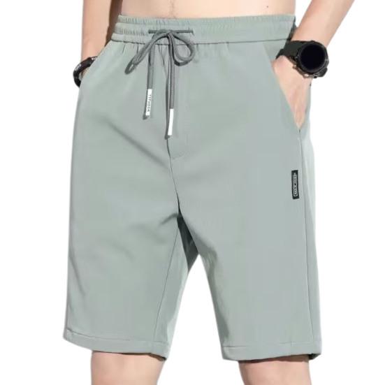 Herren Sommer Shorts Elastischer Kordelzug Taille Gerade Shorts mit weitem Bein Taschen Design Eisseide Einfarbig Sport Shorts 5XL hellgrüne