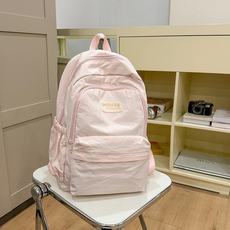 Neue Schultasche für College-Studenten Rucksack Junior High School Japanisch Schlicht Klein Frisch Campus-Rucksack Großes Fassungsvermögen Lässiger Rucksack white