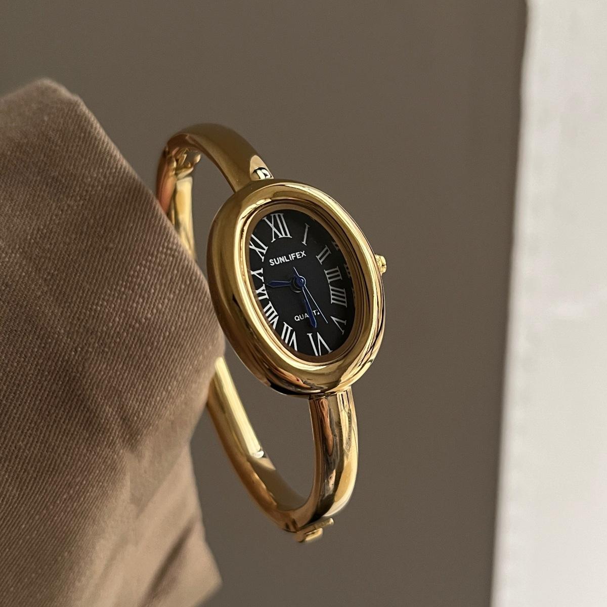 Damen Quarz Uhr Luxus Römische Ziffern Reloj Minimalistisch Schlicht Oval Uhr Damen Edelstahl Orologio Gold Gehäuse Armbanduhr