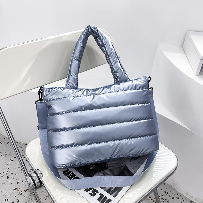 Flauschige Daunen-Tragetaschen für Damen, modische gesteppte Damen-Handtaschen, einfarbig, Luxus-Designer-Schultertaschen für Damen 34cmx17cmx23cm blau