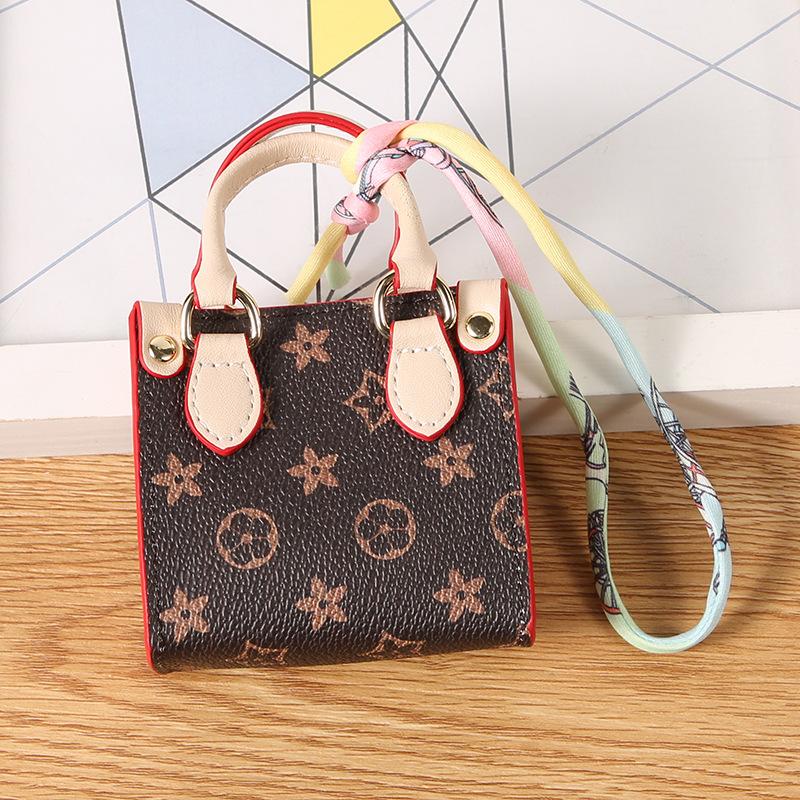 Tragetasche Mini-Wechselgeldbeutel Mini-Tasche Anhänger Kopfhörertasche Schlüsseltasche Autoanhänger Überraschung Baby-Mini-Tasche schwarz