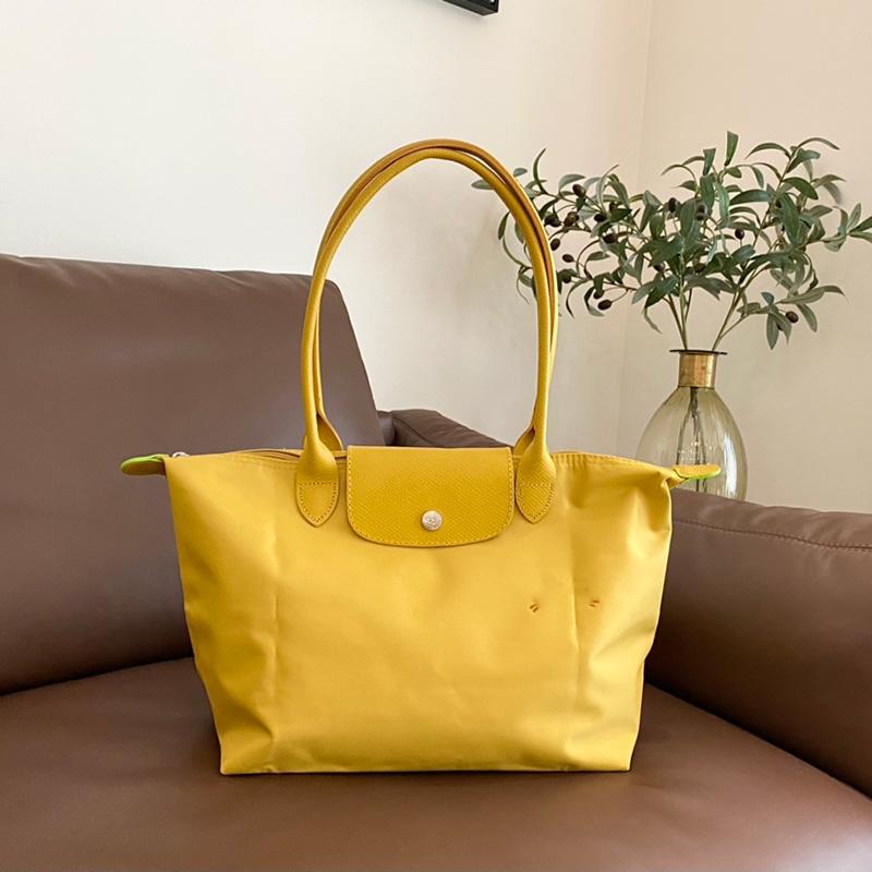 Neue Designer-Tasche Nylon Damen Handtaschen mit Logo Knödel Strandtasche Luxus-Marken-Einkaufstaschen mit Ledergriff Tragetaschen S 28cm gelb