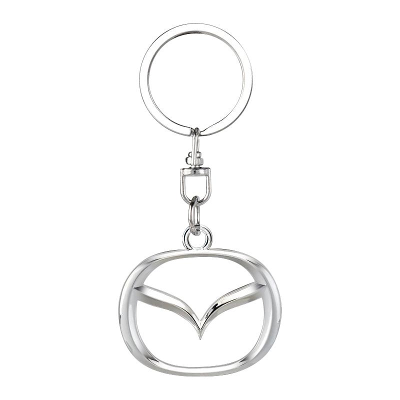 1 Stück 3D Metall Auto Emblem Schlüsselanhänger Zinklegierung Schlüsselanhänger Autozubehör Für Mazda 6 3 CX5 5 2 323 CX7 Demio Atenza Axela MX30 CX30 CX3 CX9 RX8 RX7 silber
