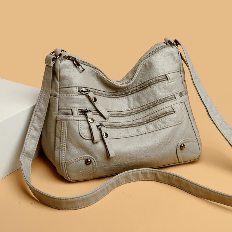 2024 Neue Schulter- und Kuriertasche aus weichem Leder mit mehreren Taschen für Damen - Ideal für Damen mittleren Alters und ältere Damen licht grau